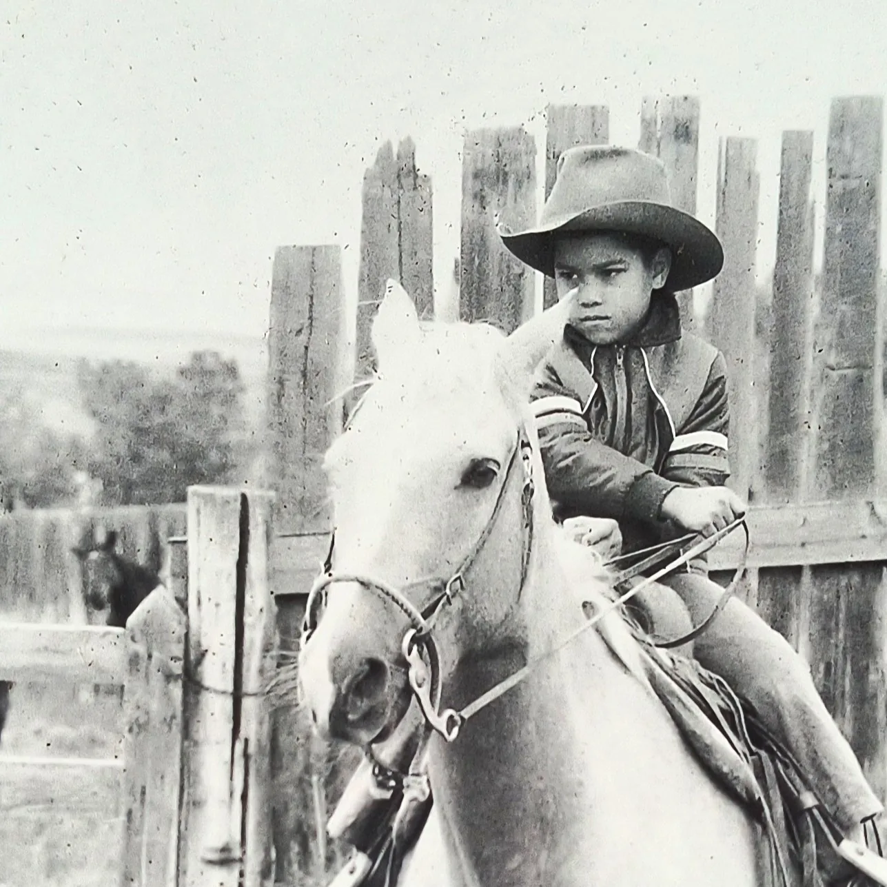 A childhood photograph of Clayton on horseback